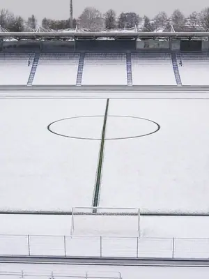 Snow on the Pitch football wallpaper, 3840 by 2160 pixels (AI-generated image)