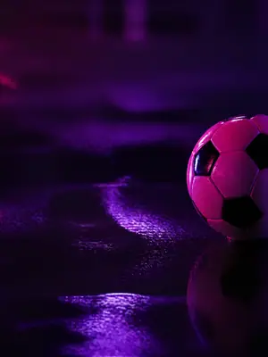 Magenta Neon football wallpaper, 3840 by 2160 pixels (AI-generated image)