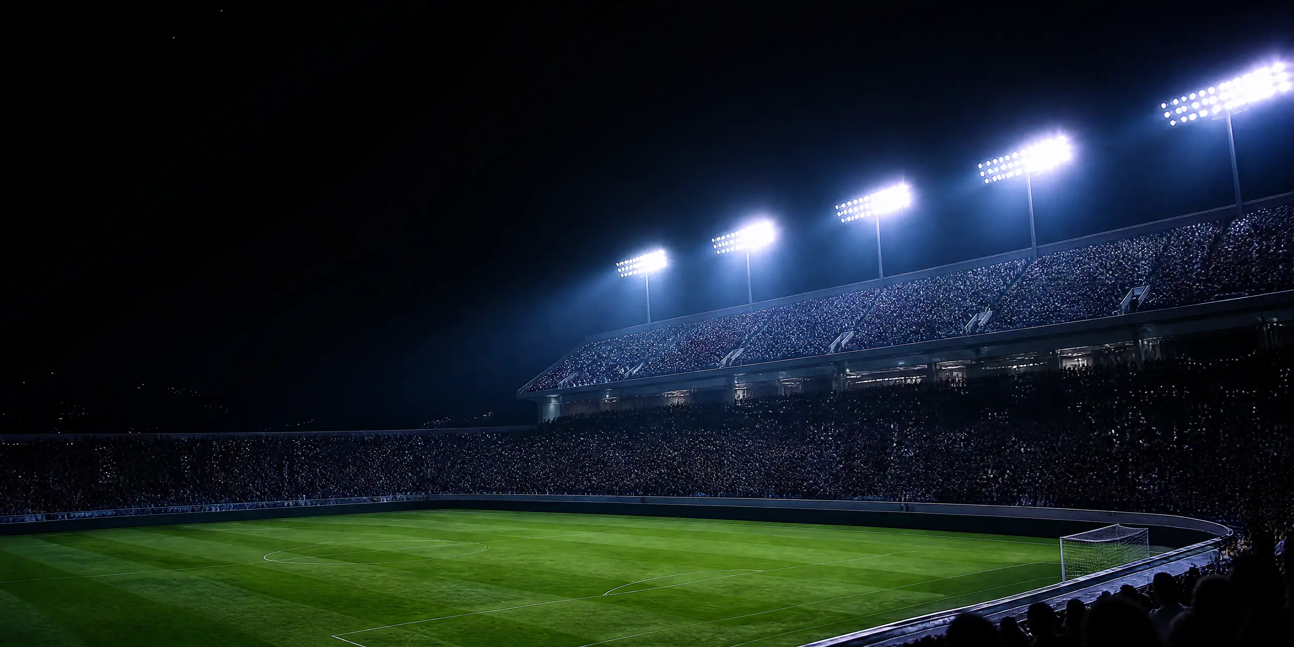 Floodlit football stadium at night (AI-generated image)